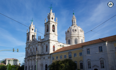 Colorful Alfama district in Lisbon with narrow streets, traditional houses, and tram – Explore Lisbon’s soul with PORTUGALTRIPGUIDES