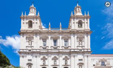 Colorful Alfama district in Lisbon with narrow streets, traditional houses, and tram – Explore Lisbon’s soul with PORTUGALTRIPGUIDES
