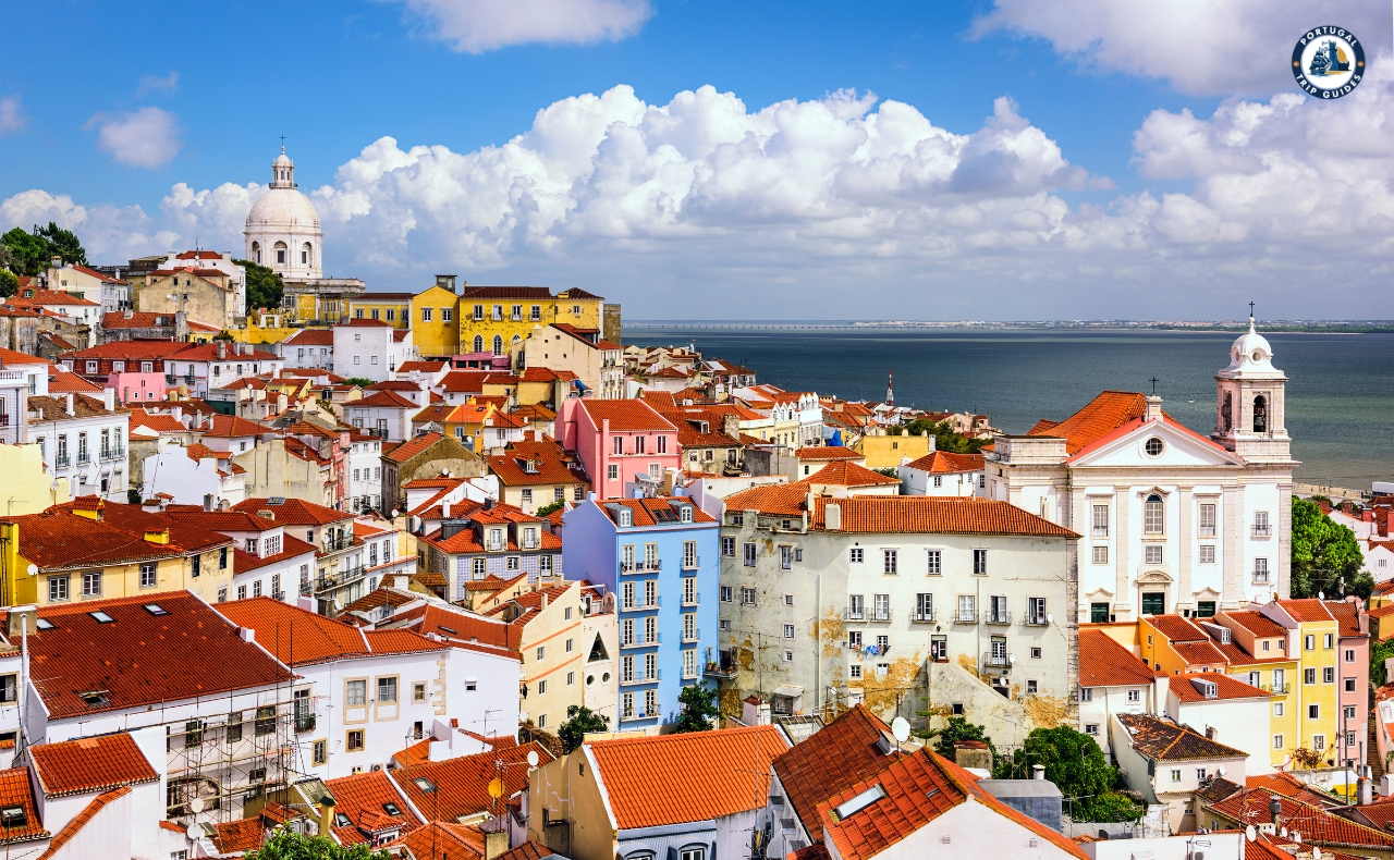 Colorful Alfama district in Lisbon with narrow streets, traditional houses, and tram – Explore Lisbon’s soul with PORTUGALTRIPGUIDES