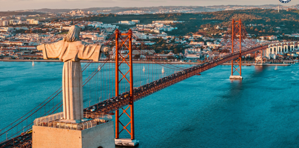 Cristo Rei statue overlooking Lisbon and the Tagus River – Discover Portugal's History and Live the Legend! | PORTUGALTRIPGUIDES
