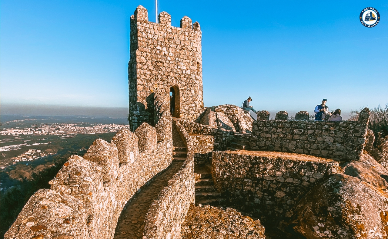 Ancient Moorish Castle in Sintra offering panoramic views of the mountains and Atlantic Ocean – Explore with PORTUGALTRIPGUIDES