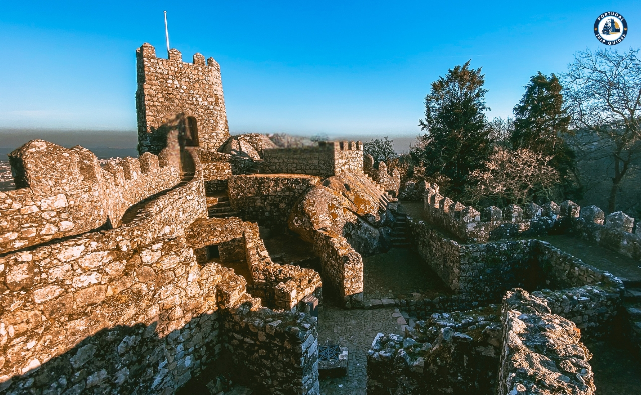 Ancient Moorish Castle in Sintra offering panoramic views of the mountains and Atlantic Ocean – Explore with PORTUGALTRIPGUIDES