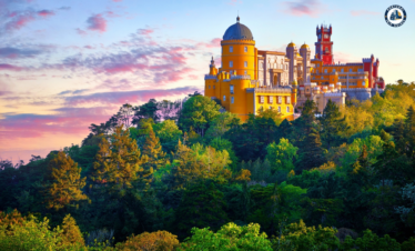Colorful towers and architecture of Pena Palace in Sintra – Discover Portugal's History and Live the Legend! | PORTUGALTRIPGUIDES