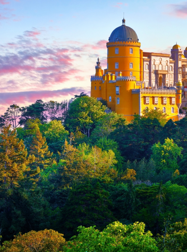 Colorful towers and architecture of Pena Palace in Sintra – Discover Portugal's History and Live the Legend! | PORTUGALTRIPGUIDES