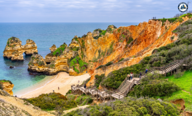 Golden beach and waves at Nazaré, Portugal – Discover Portugal's History and Live the Legend! | PORTUGALTRIPGUIDES